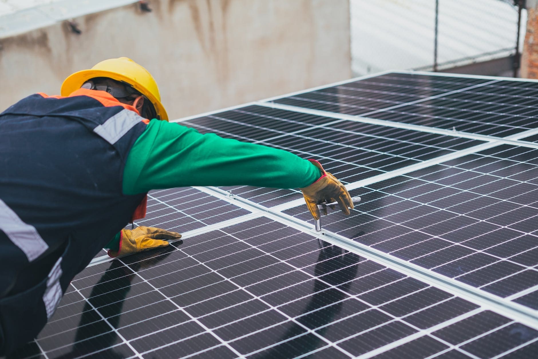 pexels-photo-8853502 solar technician installing solar panel